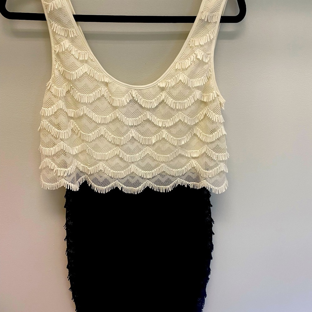 Flattering black and white cocktail dress, great for weddings, worn once.